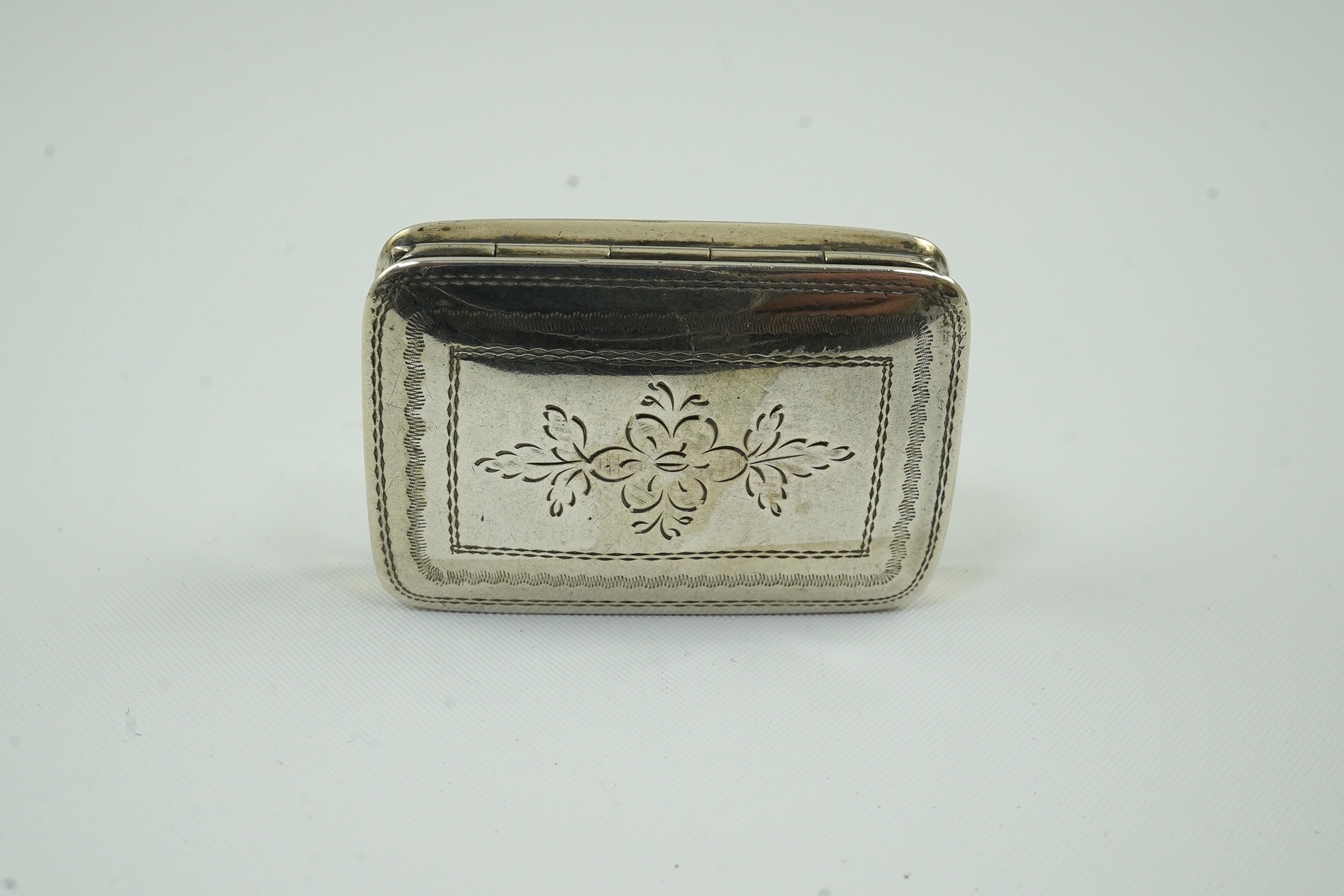 A William IV engraved silver vinaigrette by Nathaniel Mills